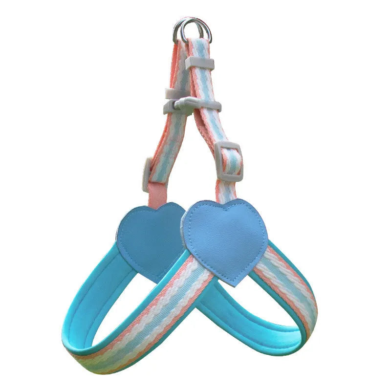Nylon dog walking chest strap vest with integrated hand-holding rope in emerald green, shown on a medium-sized dog.