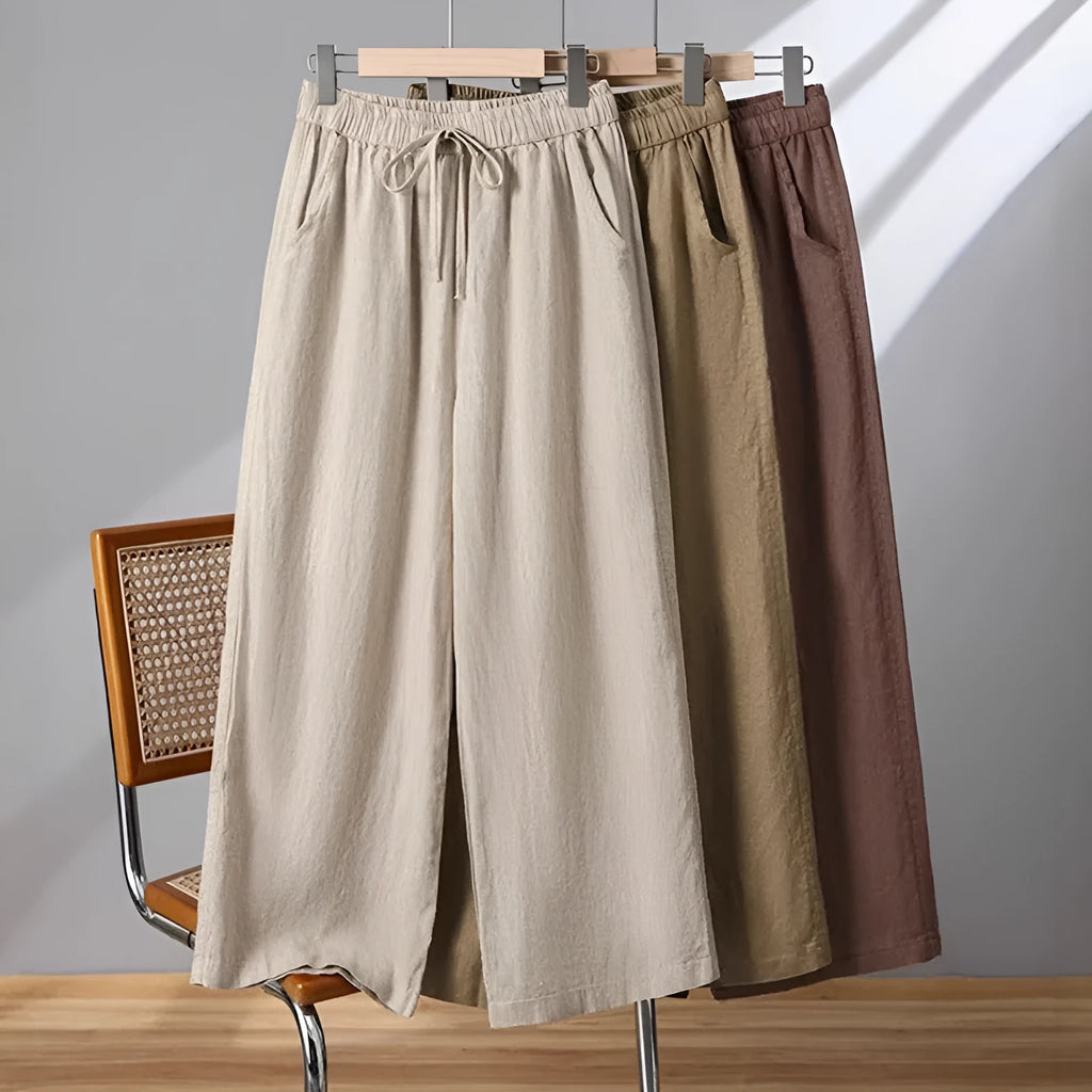 Women's straight-leg casual trousers with an elastic drawstring waist, shown in apricot colour.