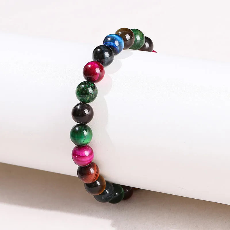 Colourful Tiger Eye stone bracelet with round beads on a mixed string, showing available sizes.