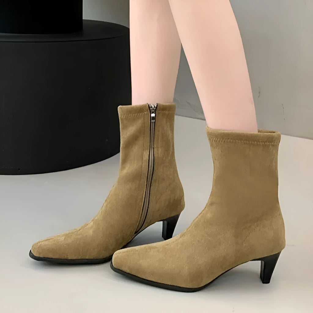 Women's brown square toe ankle booties with a side zipper and stiletto mid heel