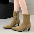 Women's brown square toe ankle booties with a side zipper and stiletto mid heel