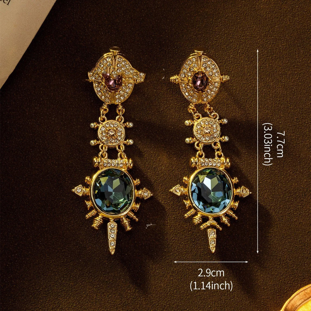 Geometric round gold-coloured stud earrings with diamond-treated alloy surface and retro elegant design