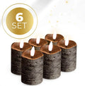 Black LED pillar candle with flickering flame effect measuring 5cm wide by 7cm tall