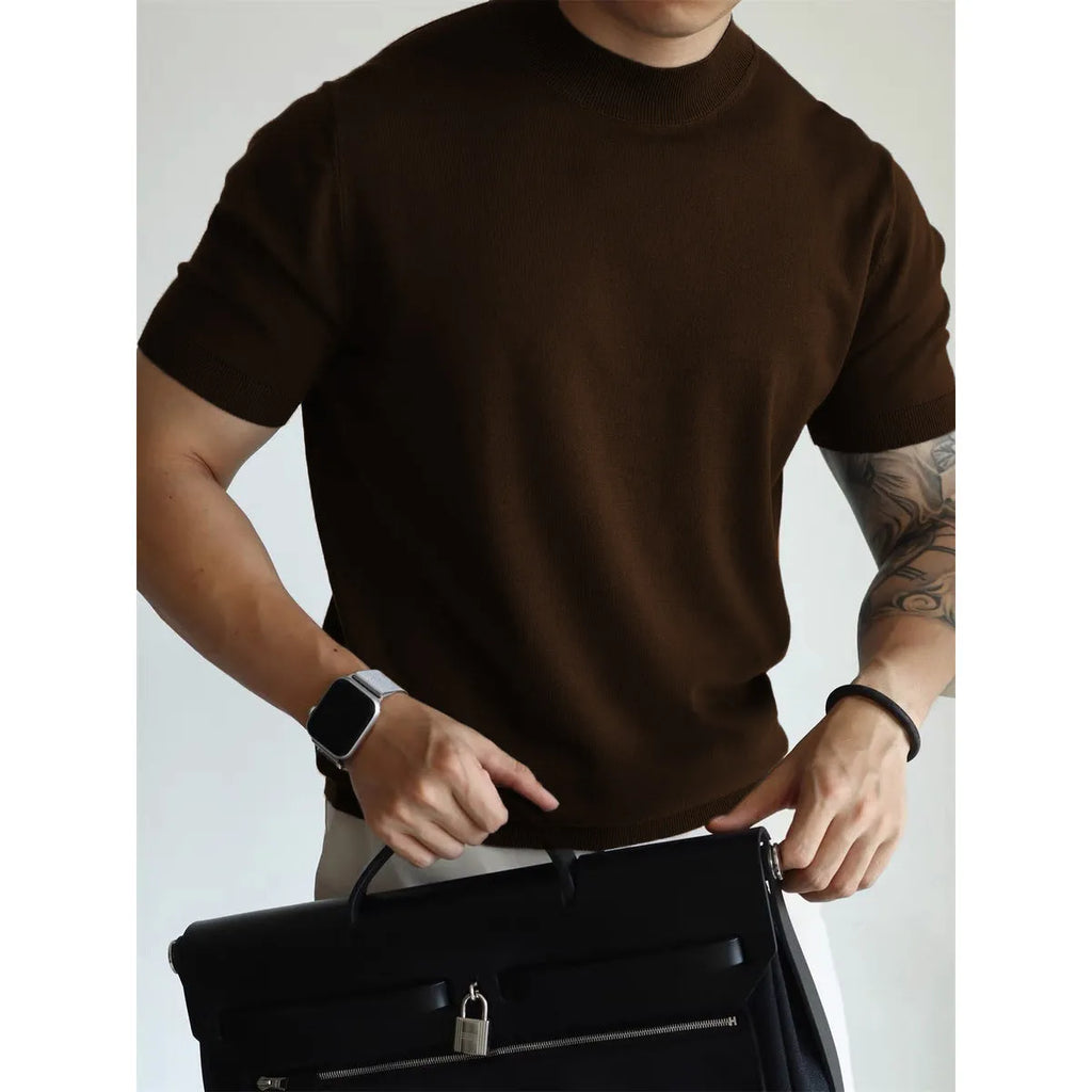 Men's slim fit solid colour t-shirt on a hanger, shown in a light neutral shade.