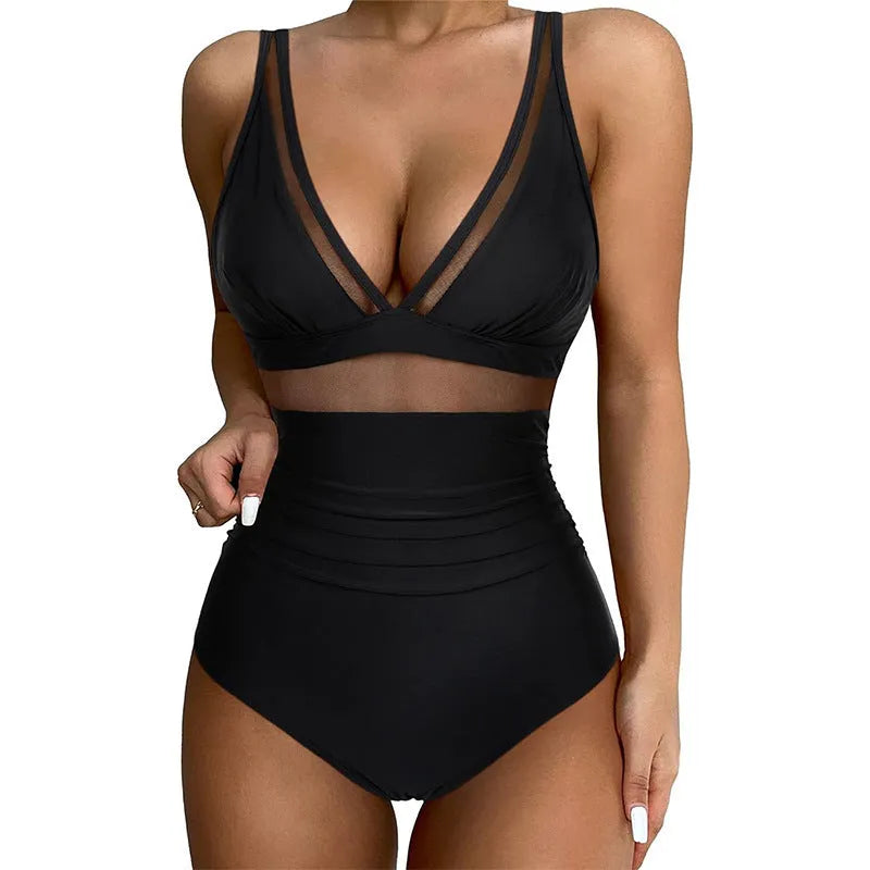 Black women's halter neck one-piece swimsuit with mesh detailing and briefs style cut