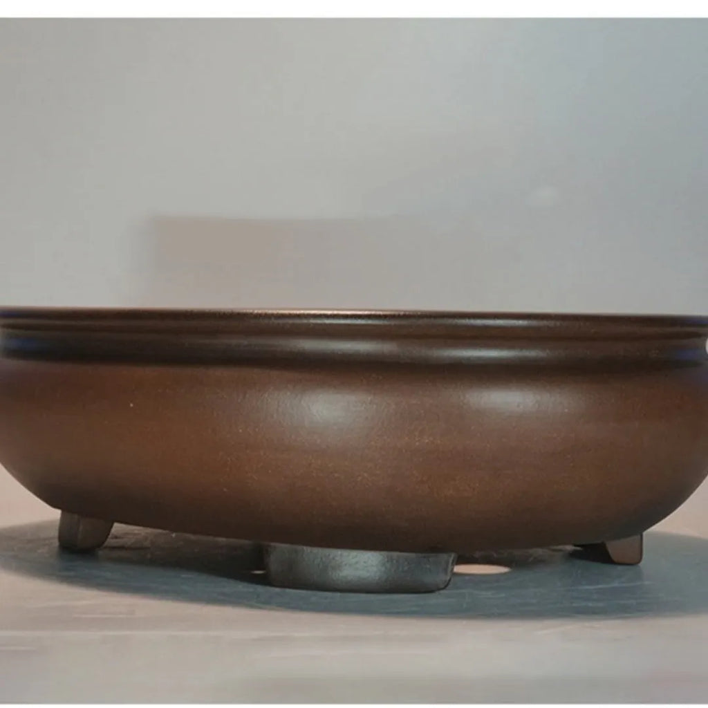 Handmade purple clay desktop flowerpot with classical design for indoor plants.