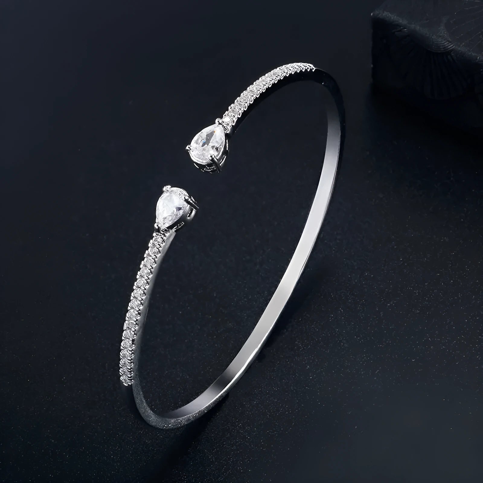 Copper bracelet with multi-zircon inlay stones in simple style, shown in white and blue colour options