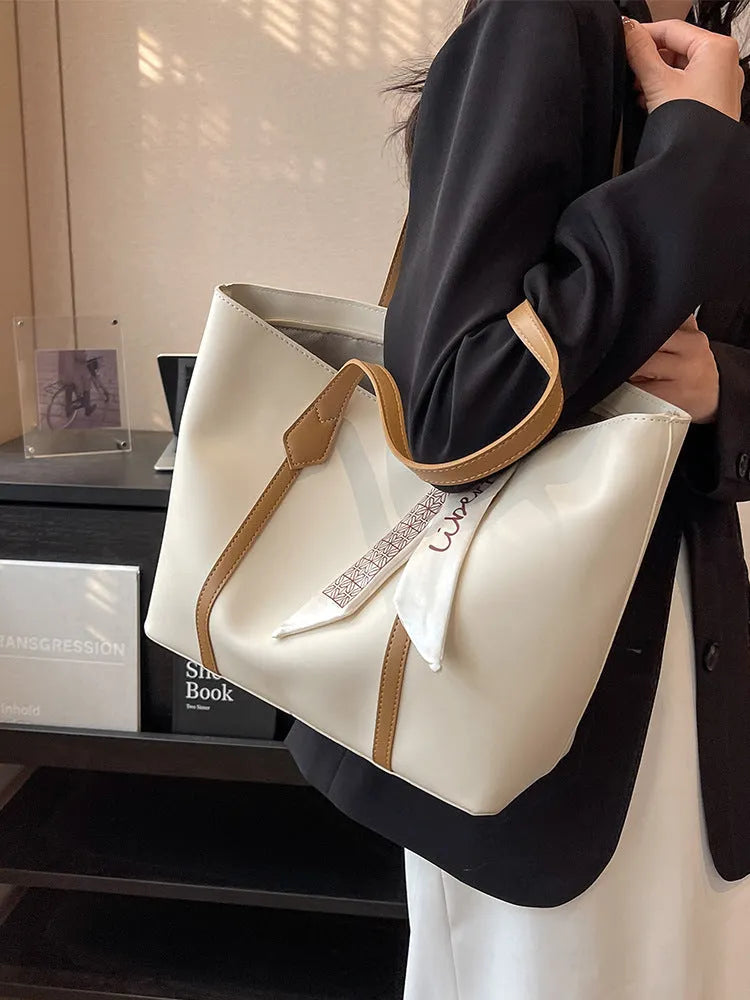 Casual tote bag with bucket fashion design in available colour combinations showing shoulder and crossbody carry options