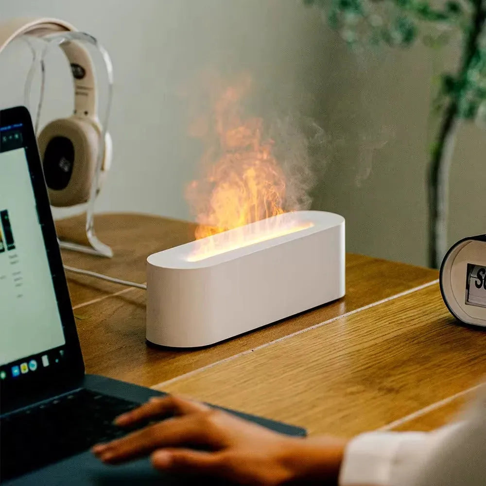 Square creative lava flame atmosphere humidifier and aroma diffuser with colourful LED lights on a desktop.