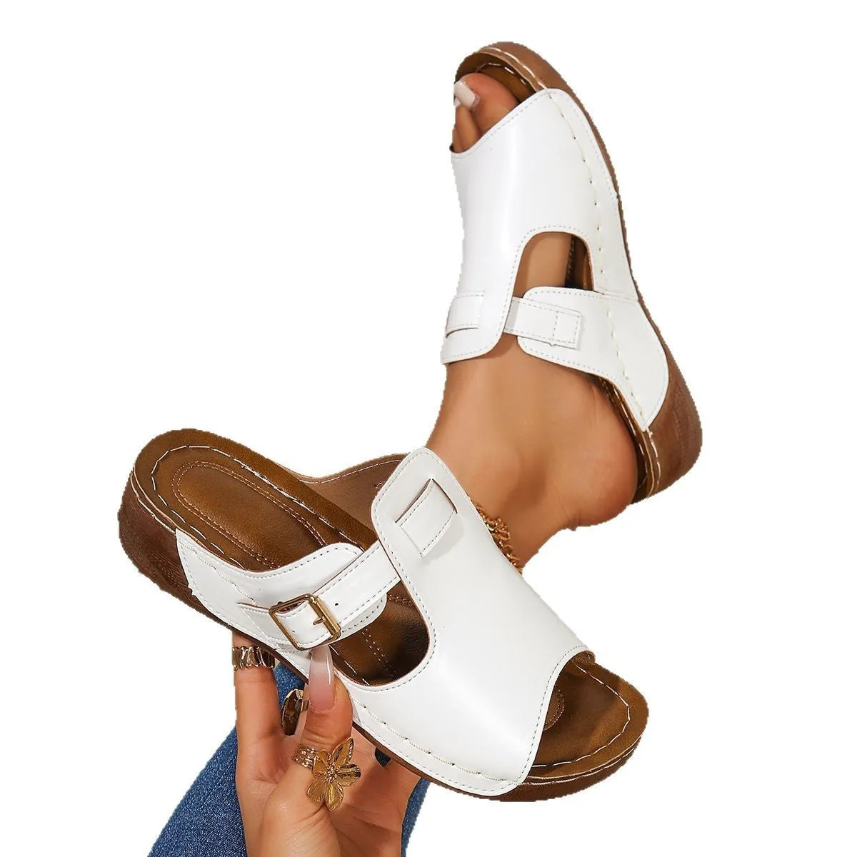 Women's light pink casual slippers with a fish mouth toe and slip-on design.