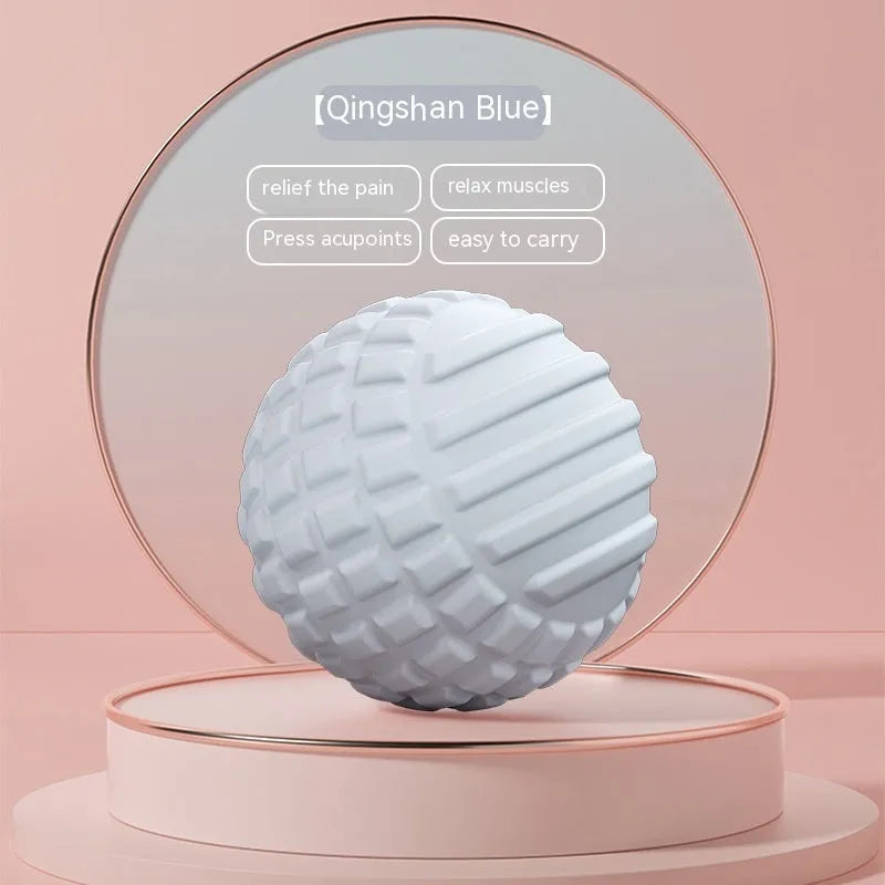 Blue TPR foot massage ball with 6cm diameter on a plain background
