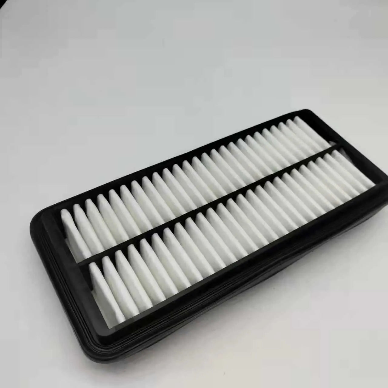 Black car air filter replacement part measuring 256mm by 113mm by 40mm for Modern vehicles