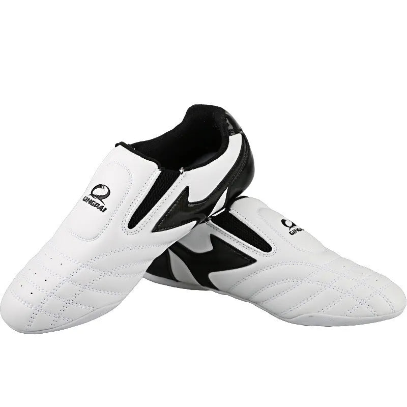 Black and white children's martial arts training shoes with soft bottom and widened design