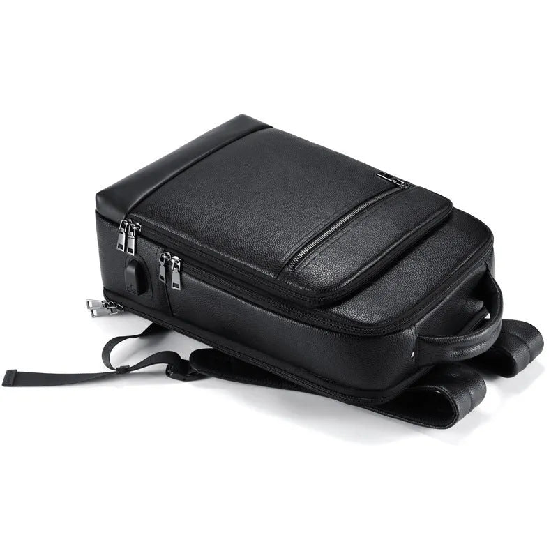 Black leather men's business computer backpack with sewing line detailing and curved shoulder straps