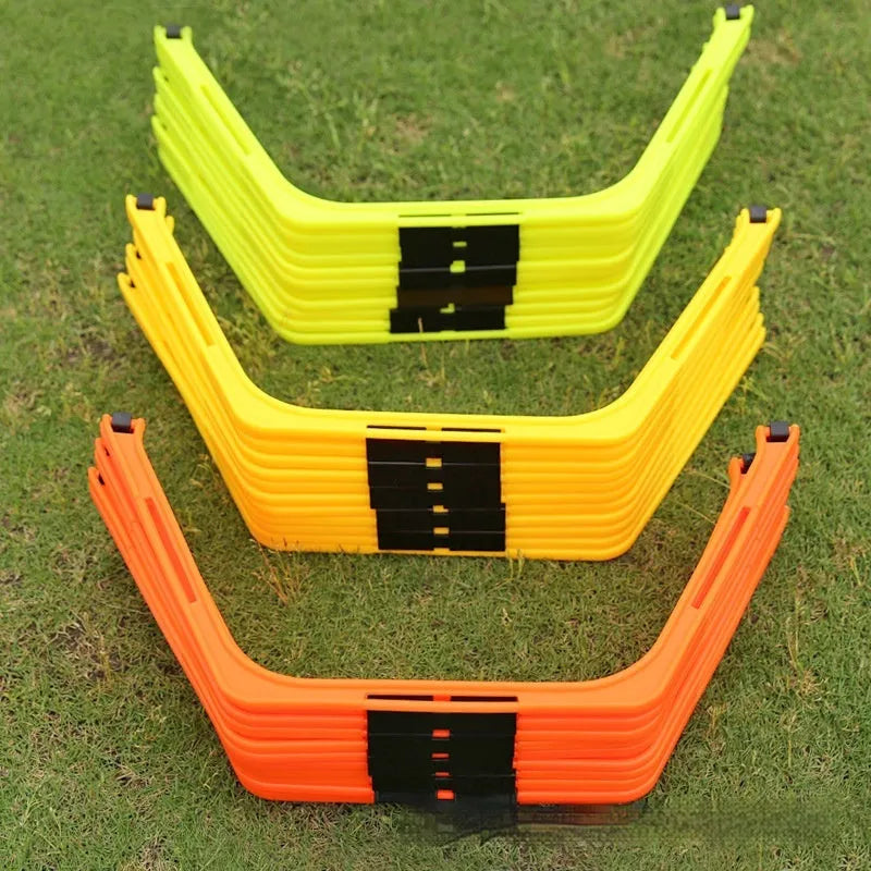 Set of six foldable yellow, green, and orange hexagon plastic agility training rings for football drills.