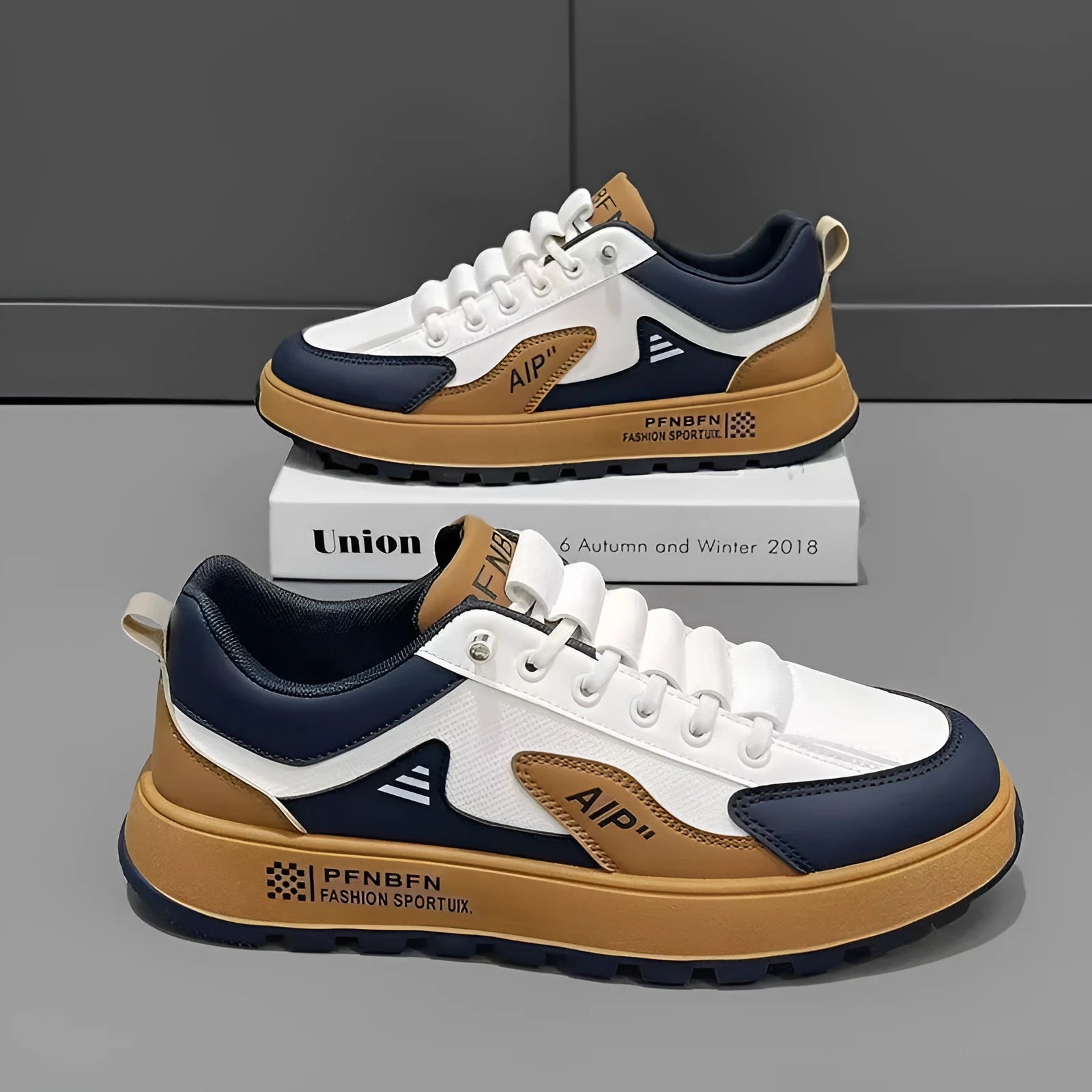 Men's casual shoes with artificial PU upper in round toe design showing breathable sports style