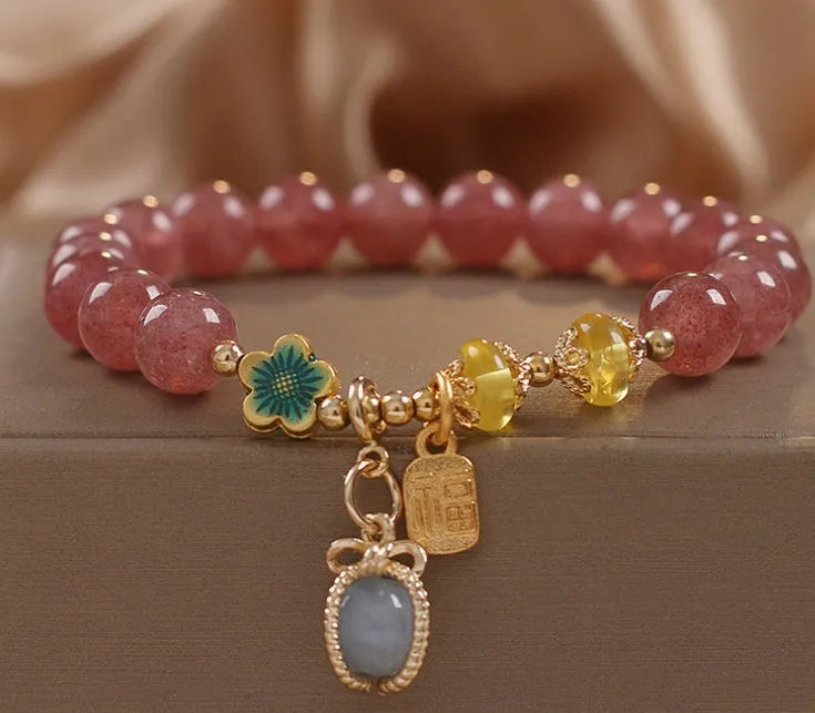 Red women's bracelet with strawberry quartz beads, alloy components, and rhinestones
