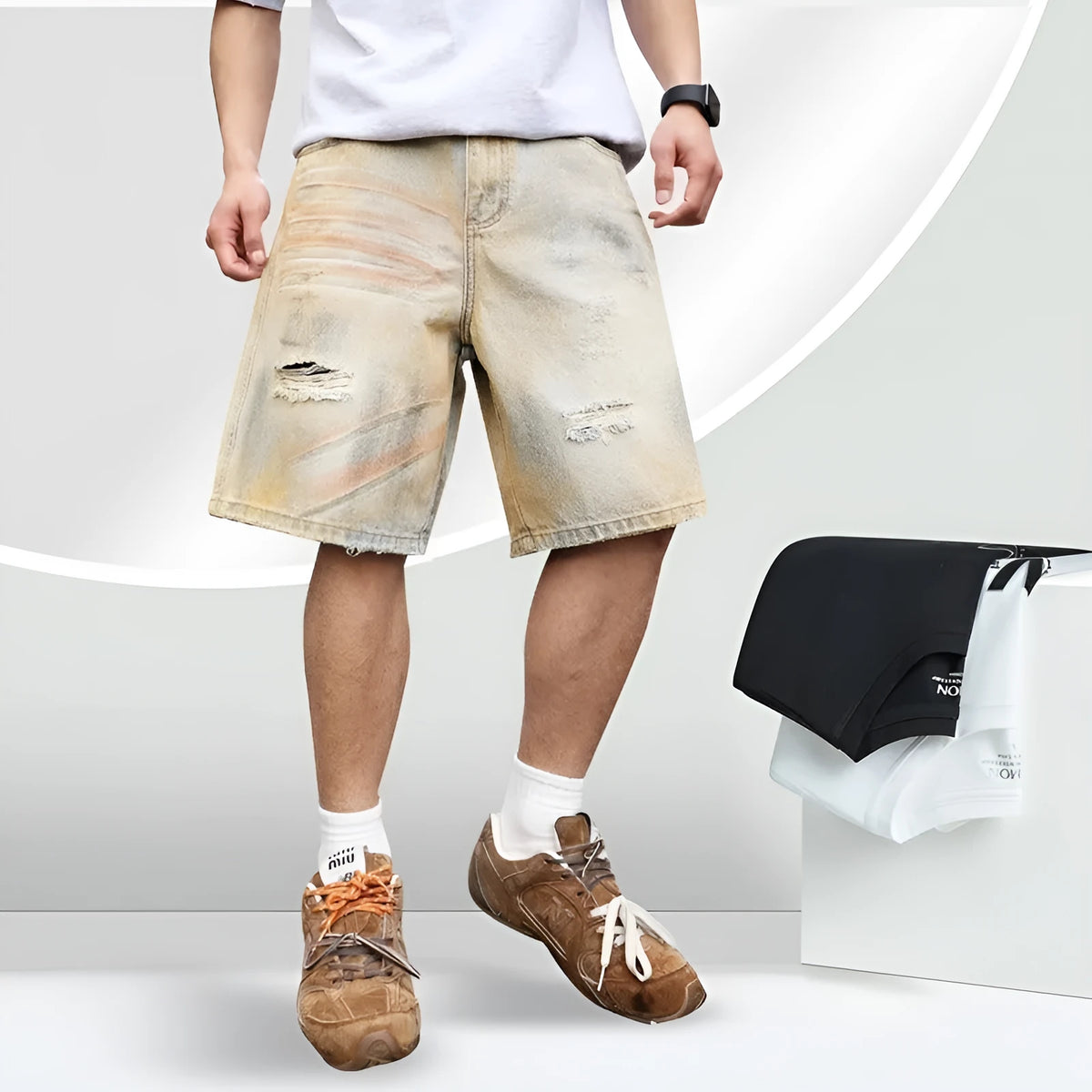Light blue washed men's denim shorts with ripped details on a straight-leg cut