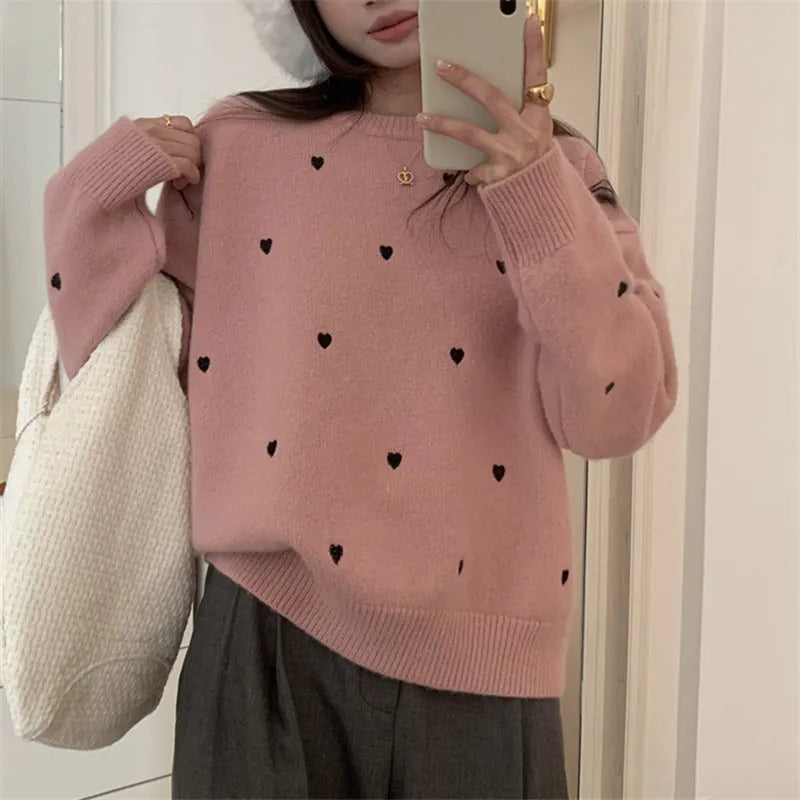 Women's loose-fitting acrylic pullover sweater with love embroidery in milky white, long sleeves, crew neck.