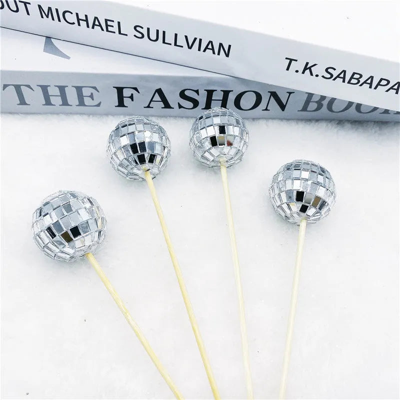 Glass disco ball cake decoration on wooden stick in various sizes from 2.5cm to 5cm diameter
