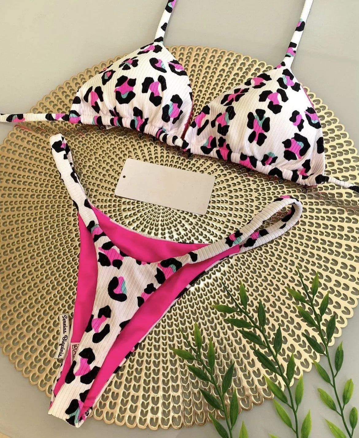 Women's printed bikini swimsuit in briefs style with quick-dry fabric.