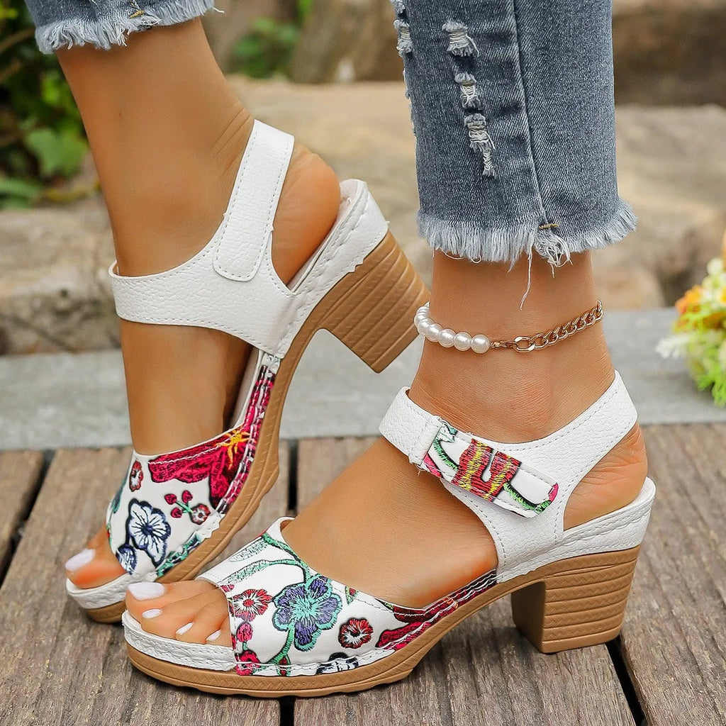White women's high heel casual sandals with a visible Velcro strap buckle on the instep.