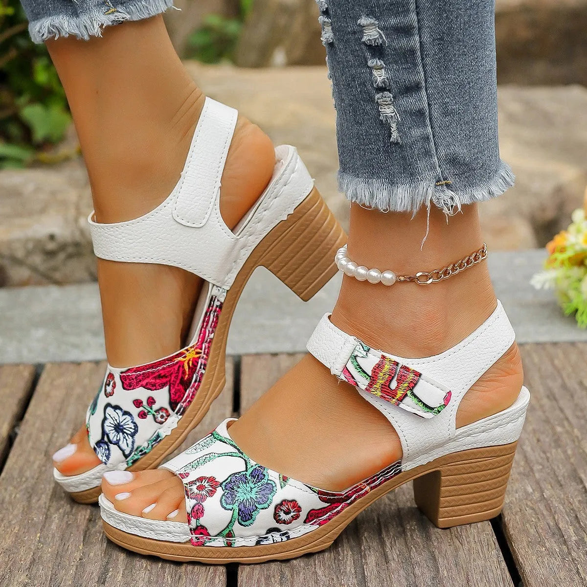 White women's high heel casual sandals with a visible Velcro strap buckle on the instep.