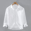 Men's solid colour linen long sleeve shirt in a cardigan style, shown in ankarat red