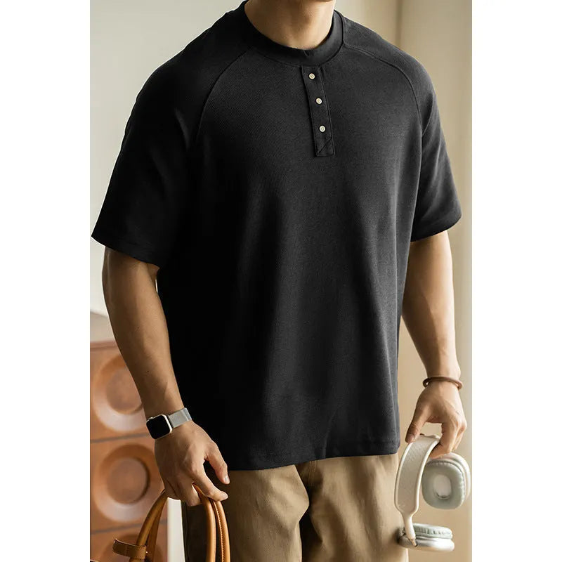 Casual loose top with raglan sleeves in terry texture fabric, shown in neutral colours