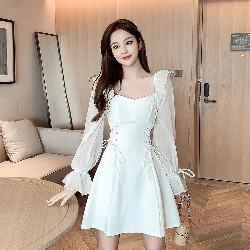 White chiffon patchwork waist-slimming dress with long sleeves and knee-length skirt