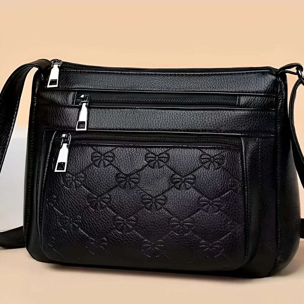 Butterfly black women's crossbody bag with embossed PU leather and horizontal square design
