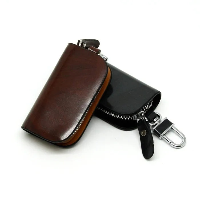 Genuine leather car key case with zipper closure in black or brown colour