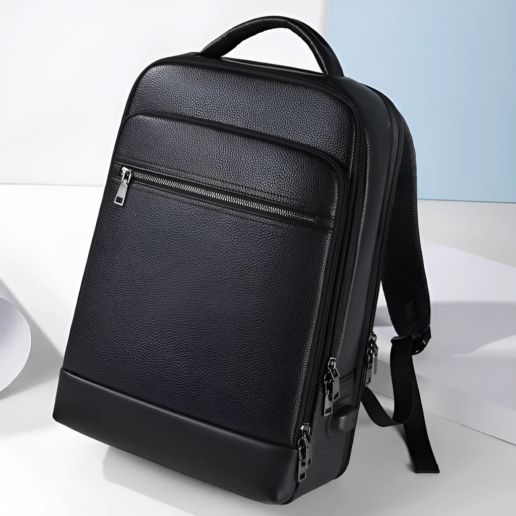 Black leather men's business computer backpack with sewing line detailing and curved shoulder straps