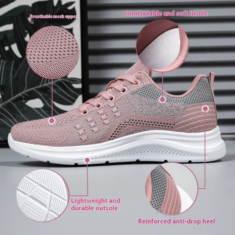 Women's low-top black mesh sneakers with a round toe and white PVC sole on a plain background.