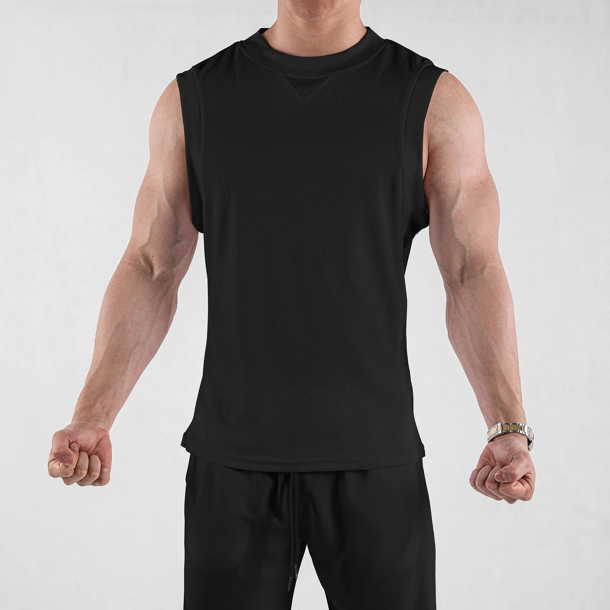 Men's quick-dry workout vest in black with loose fit design for summer sports