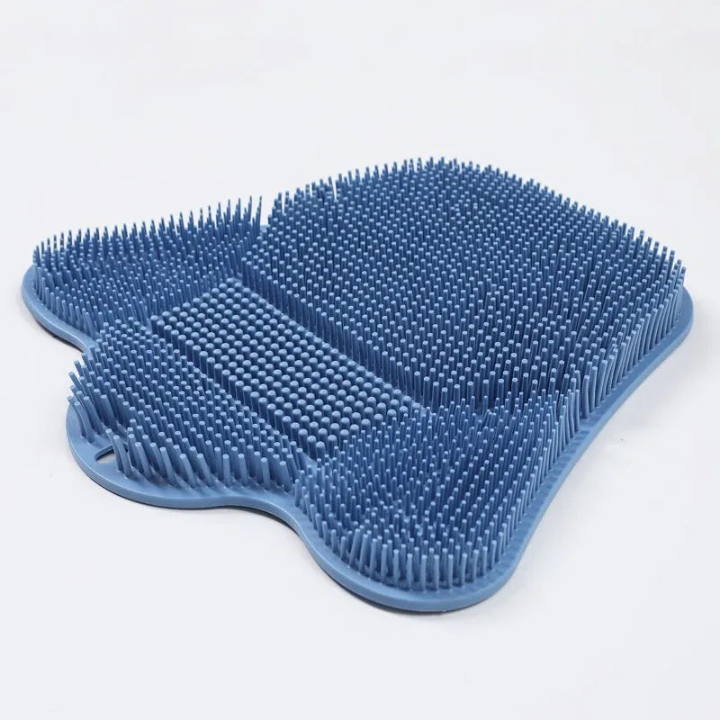 Silicone bath massage cushion mat measuring 31x32cm in blue colour with textured surface for foot scrubbing