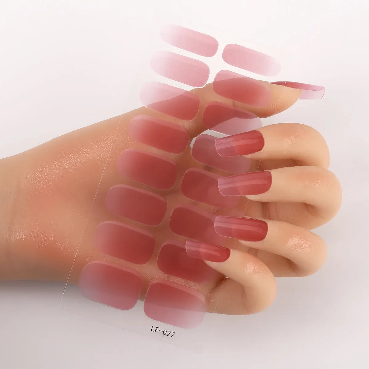 Full coverage nail art stickers sheet with 16 designs including cross, rose, tulip, and cartoon patterns.