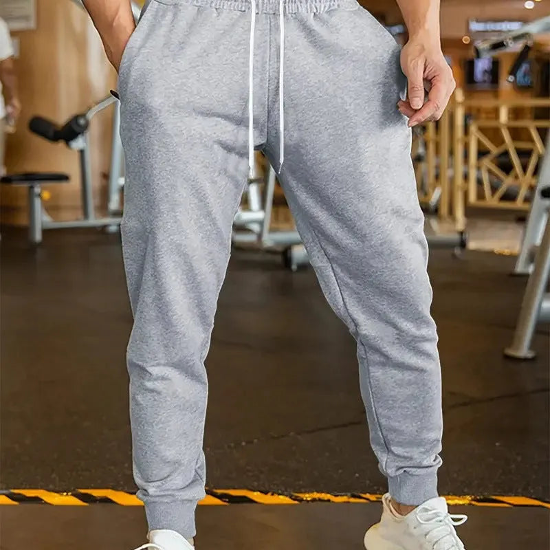 Men's linen style leisure trousers with elastic drawstring waist in loose fit cut