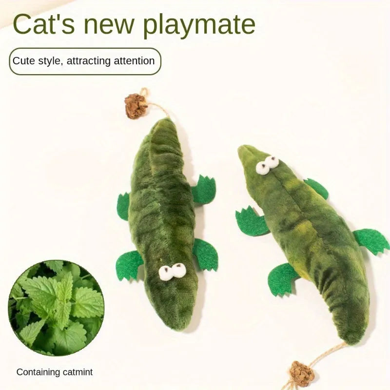 Green plush alligator catnip toy with natural peppermint scent for feline oral cleansing