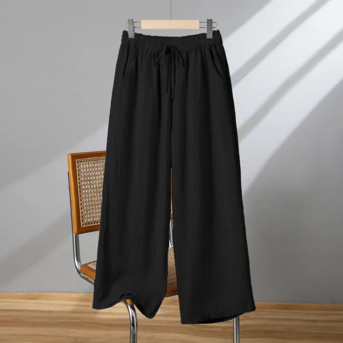 Women's straight-leg casual trousers with an elastic drawstring waist, shown in apricot colour.