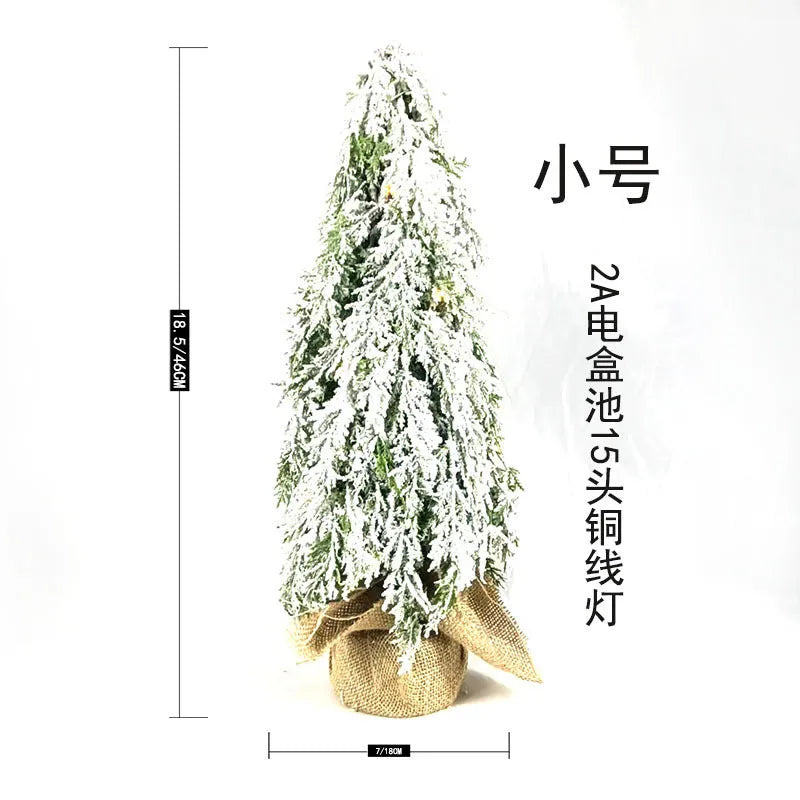 24 inch artificial Christmas tree sprayer with lights on desktop