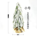 24 inch artificial Christmas tree sprayer with lights on desktop