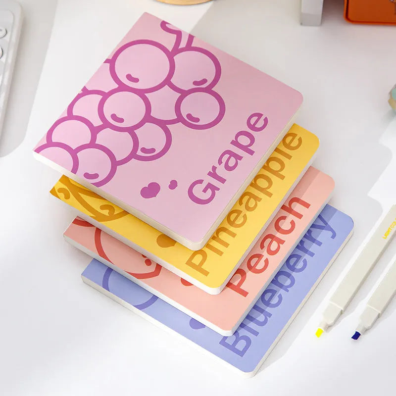Square fruit design notebook showing embossed pineapple, blueberry, grape, and peach cover options