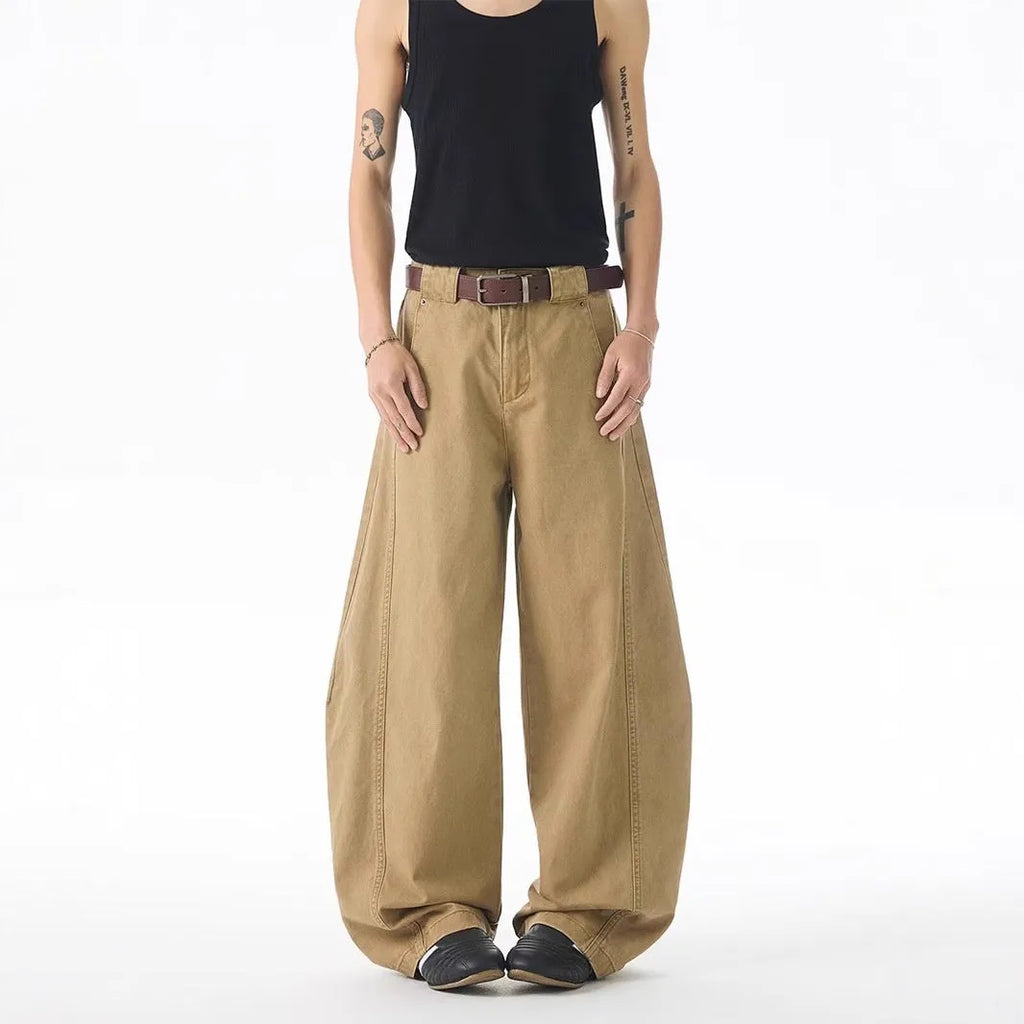 Men's brown loose fit denim jeans with straight leg and button fly
