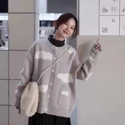 Women's blue cloud pattern cardigan sweater with long sleeves and loose fit