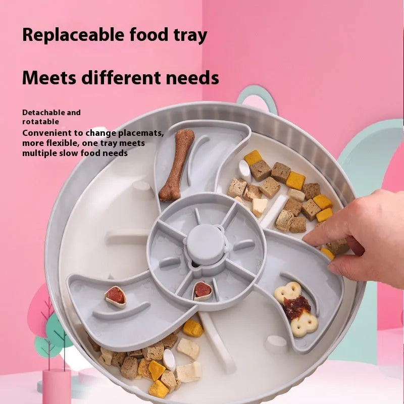 Interactive dog slow feeder bowl with rotating game board and textured silicone licking mat insert.