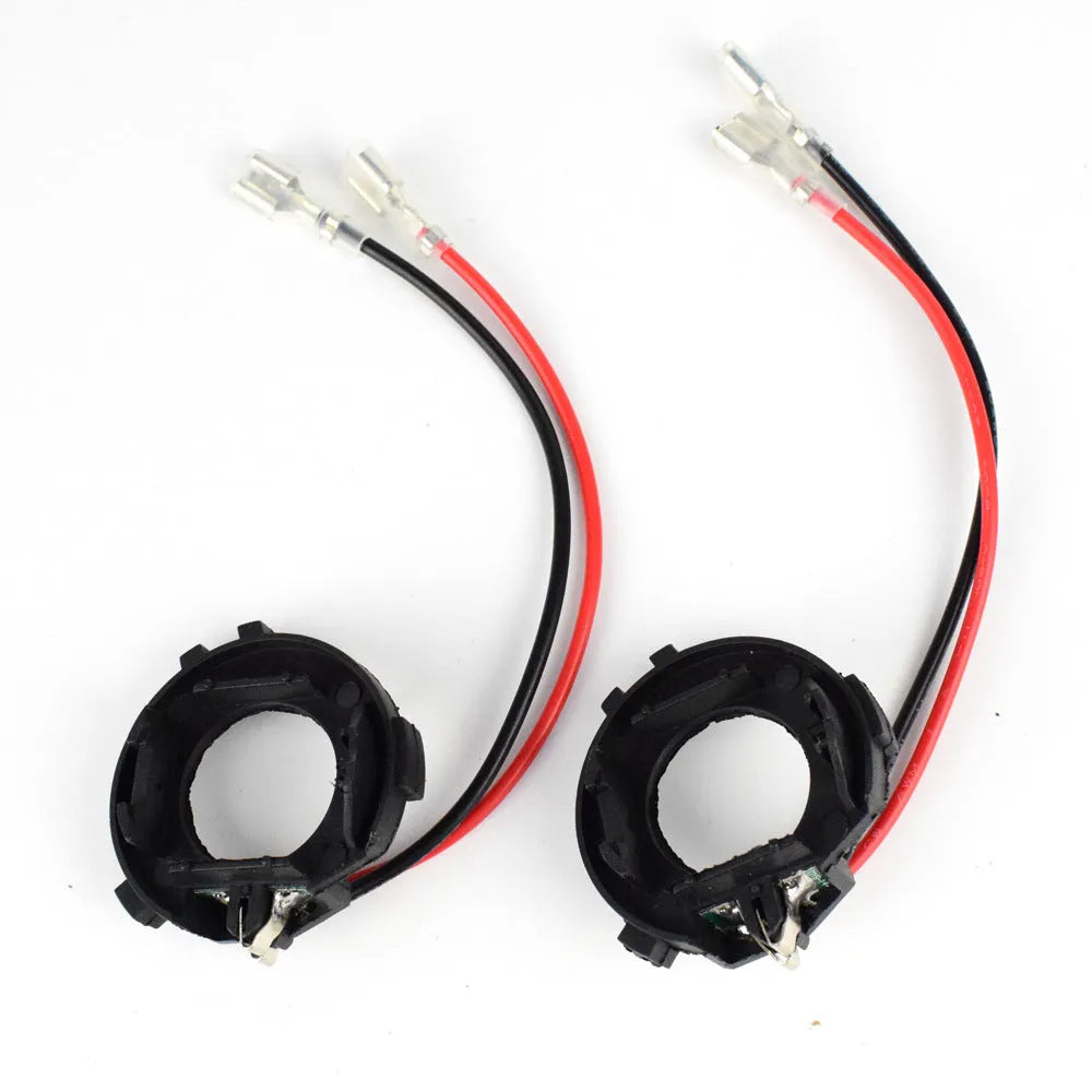 Black plastic H7 LED headlight adapter bracket with copper wiring for Volkswagen cars.