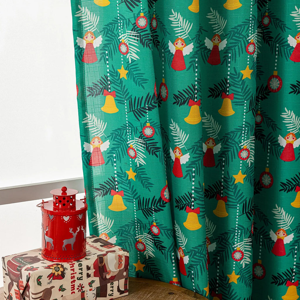 Christmas snowman angel print curtain in green colour with cartoon figures pattern