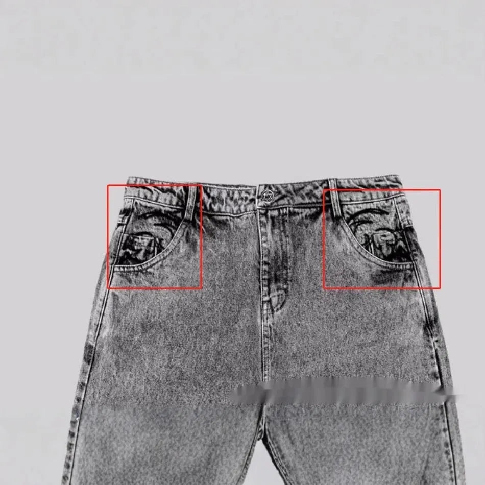 Grey loose straight-leg denim trousers for men and women on a neutral background