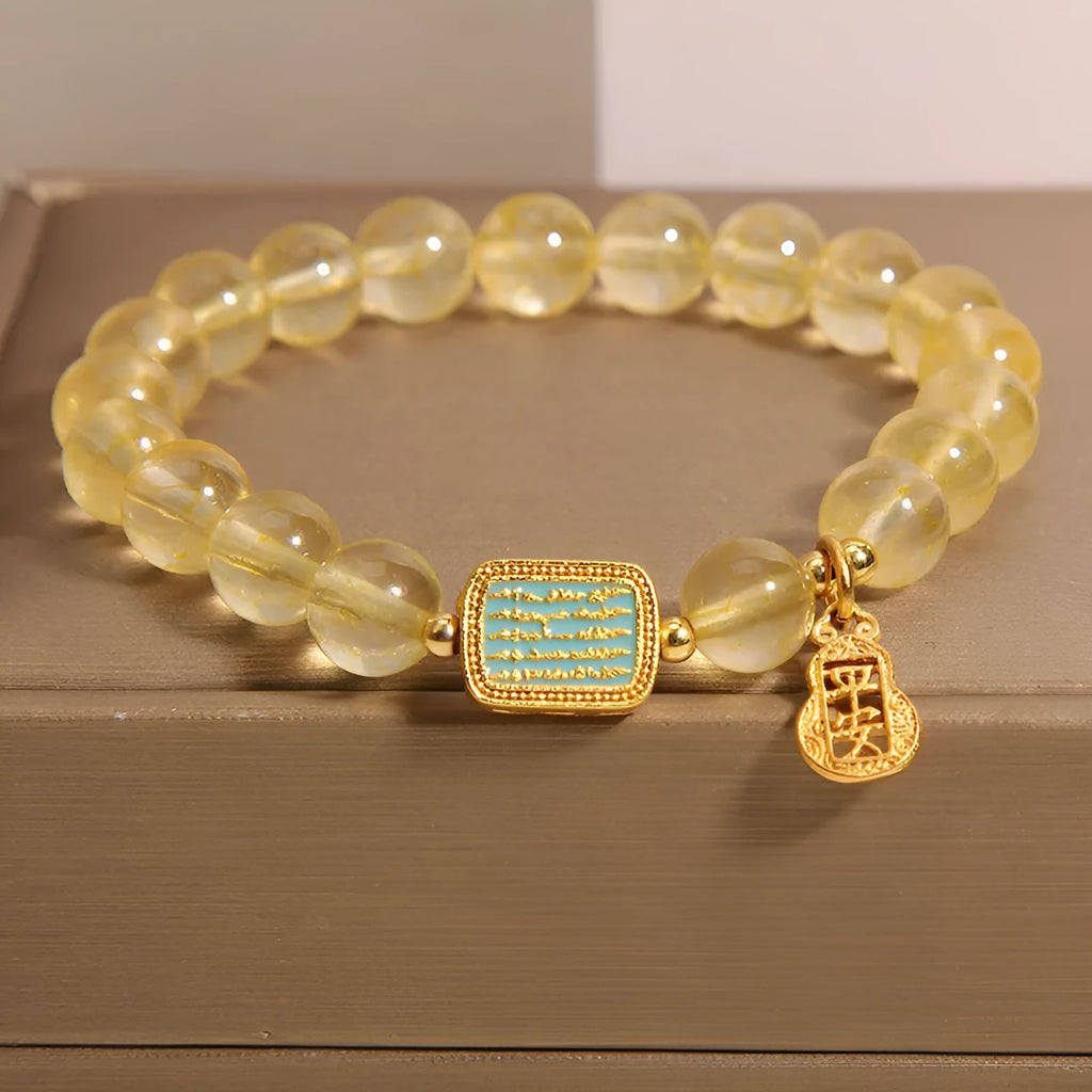 Women's natural yellow citrine crystal bracelet with rhinestone decorative details